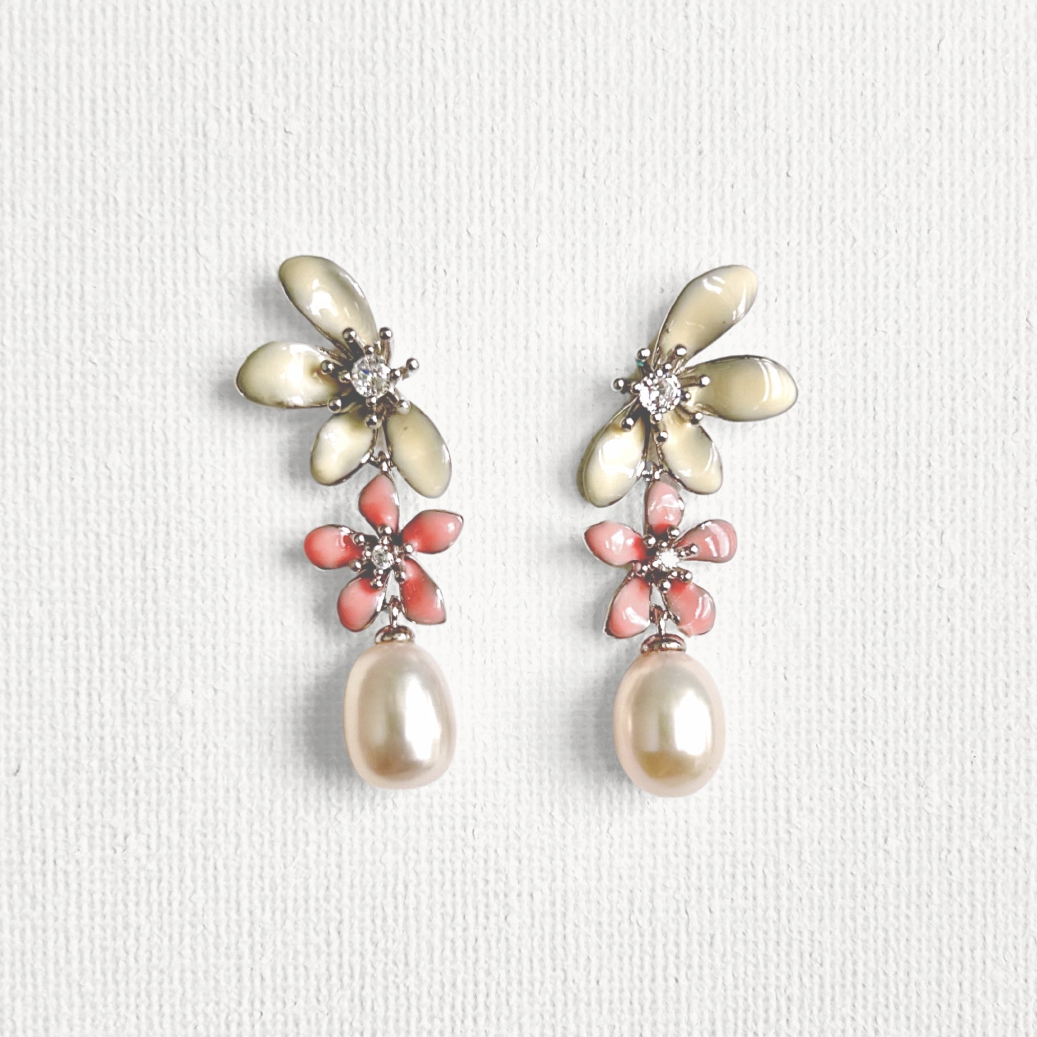 Natural Pearl Large Flower Enamel Drip Stud Earrings featuring natural pearl and white gold-plated brass, gold-plated brass, silver ear pins, enamel by Toronto-based Meng Jewellery