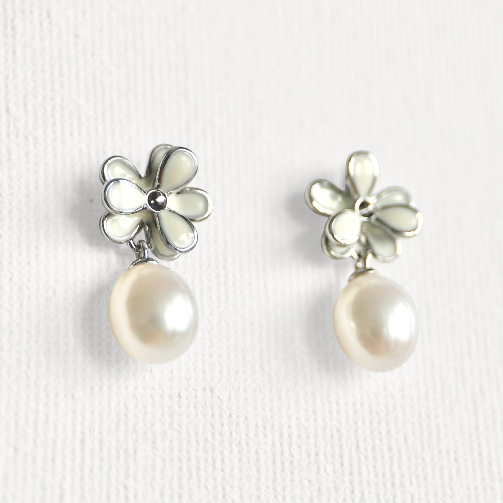 Natural Pearl Minimal Flower Enamel Drip Stud Earrings featuring natural pearl and gold-plated brass, silver ear pins, enamel by Toronto-based Meng Jewellery