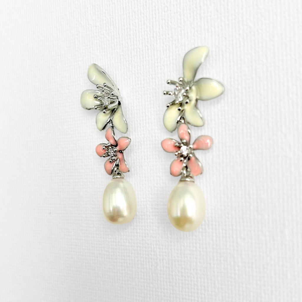 Natural Pearl Large Flower Enamel Drip Stud Earrings featuring natural pearl and white gold-plated brass, gold-plated brass, silver ear pins, enamel by Toronto-based Meng Jewellery