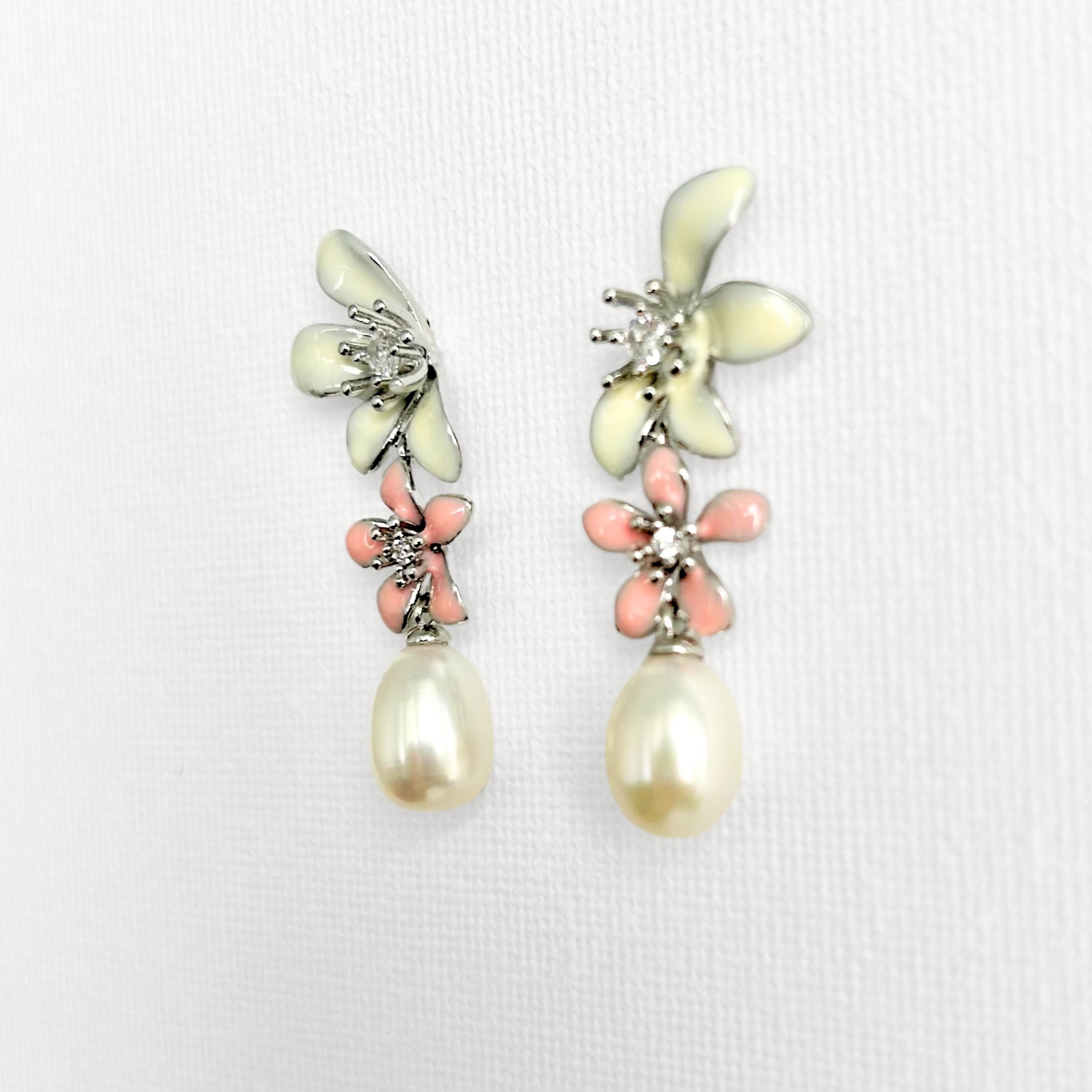 Natural Pearl Large Flower Enamel Drip Stud Earrings featuring natural pearl and white gold-plated brass, gold-plated brass, silver ear pins, enamel by Toronto-based Meng Jewellery