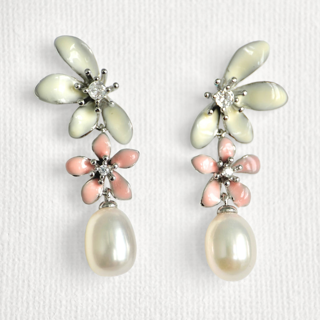 Natural Pearl Large Flower Enamel Drip Stud Earrings featuring natural pearl and white gold-plated brass, gold-plated brass, silver ear pins, enamel by Toronto-based Meng Jewellery