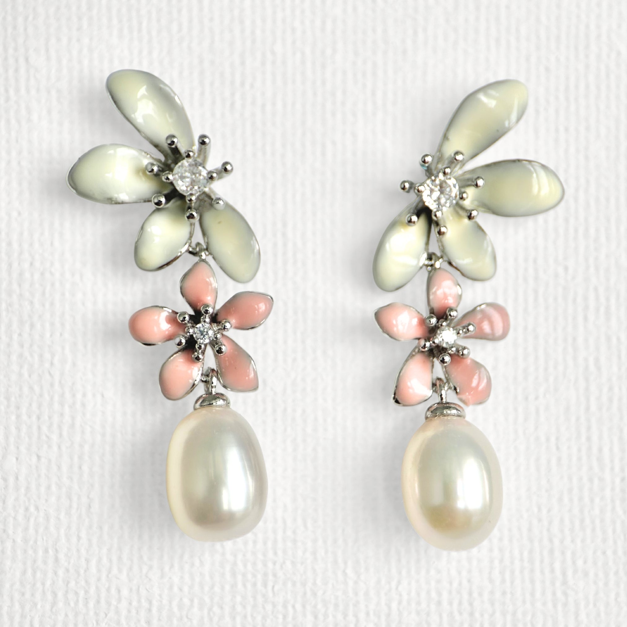 Natural Pearl Large Flower Enamel Drip Stud Earrings featuring natural pearl and white gold-plated brass, gold-plated brass, silver ear pins, enamel by Toronto-based Meng Jewellery