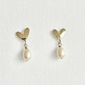 Natural Pearl Heart Stud Earrings featuring natural pearl and gold-plated brass, silver ear pins by Toronto-based Meng Jewellery