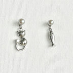 Natural Pearl Fish & Cat Stud Earrings featuring natural pearl and gold-plated brass, silver ear pins by Toronto-based Meng Jewellery