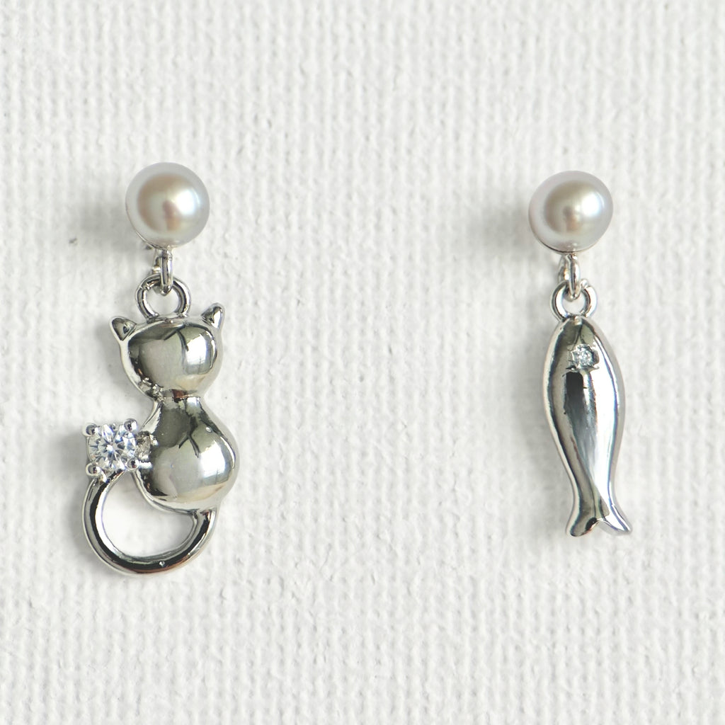 Natural Pearl Fish & Cat Stud Earrings featuring natural pearl and gold-plated brass, silver ear pins by Toronto-based Meng Jewellery