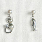 Natural Pearl Fish & Cat Stud Earrings featuring natural pearl and gold-plated brass, silver ear pins by Toronto-based Meng Jewellery