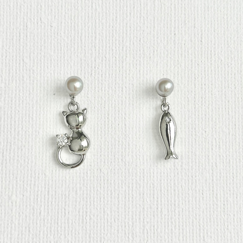 Natural Pearl Fish & Cat Stud Earrings featuring natural pearl and gold-plated brass, silver ear pins by Toronto-based Meng Jewellery