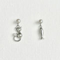 Natural Pearl Fish & Cat Stud Earrings featuring natural pearl and gold-plated brass, silver ear pins by Toronto-based Meng Jewellery
