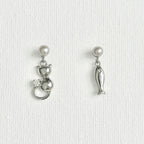 Natural Pearl Fish & Cat Stud Earrings featuring natural pearl and gold-plated brass, silver ear pins by Toronto-based Meng Jewellery