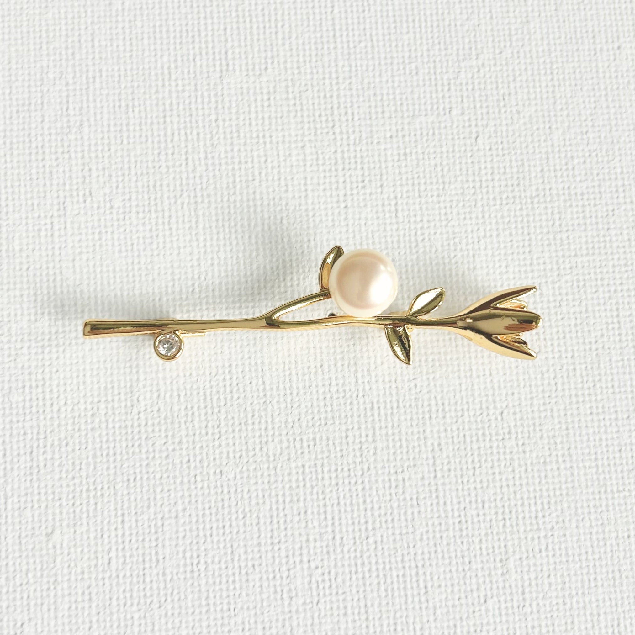 Freshwater Pearl Flower Brooch featuring natural pearl and gold-plated brass by Toronto-based Meng Jewellery