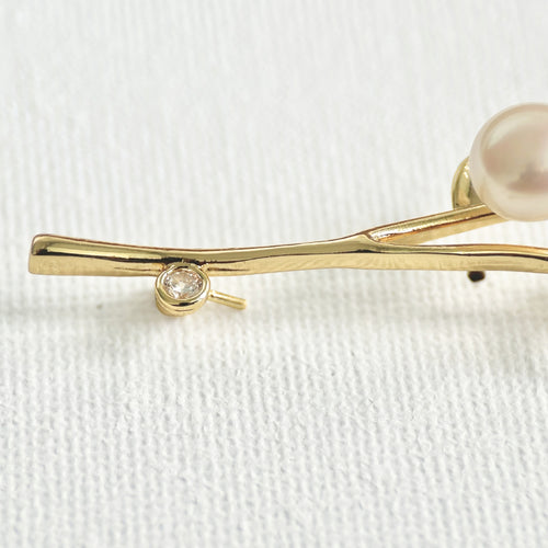 Freshwater Pearl Flower Brooch featuring natural pearl and gold-plated brass by Toronto-based Meng Jewellery