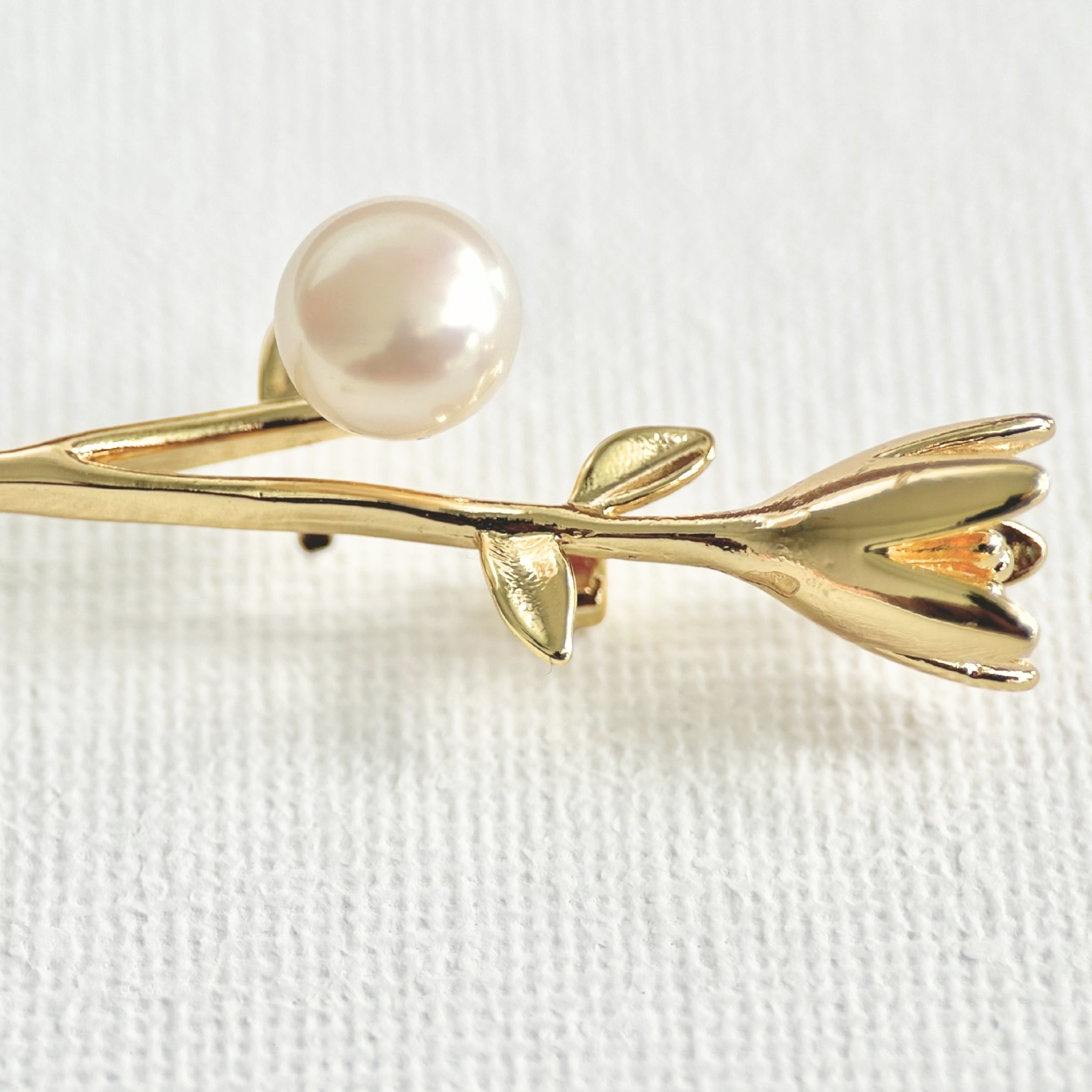 Freshwater Pearl Flower Brooch featuring natural pearl and gold-plated brass by Toronto-based Meng Jewellery