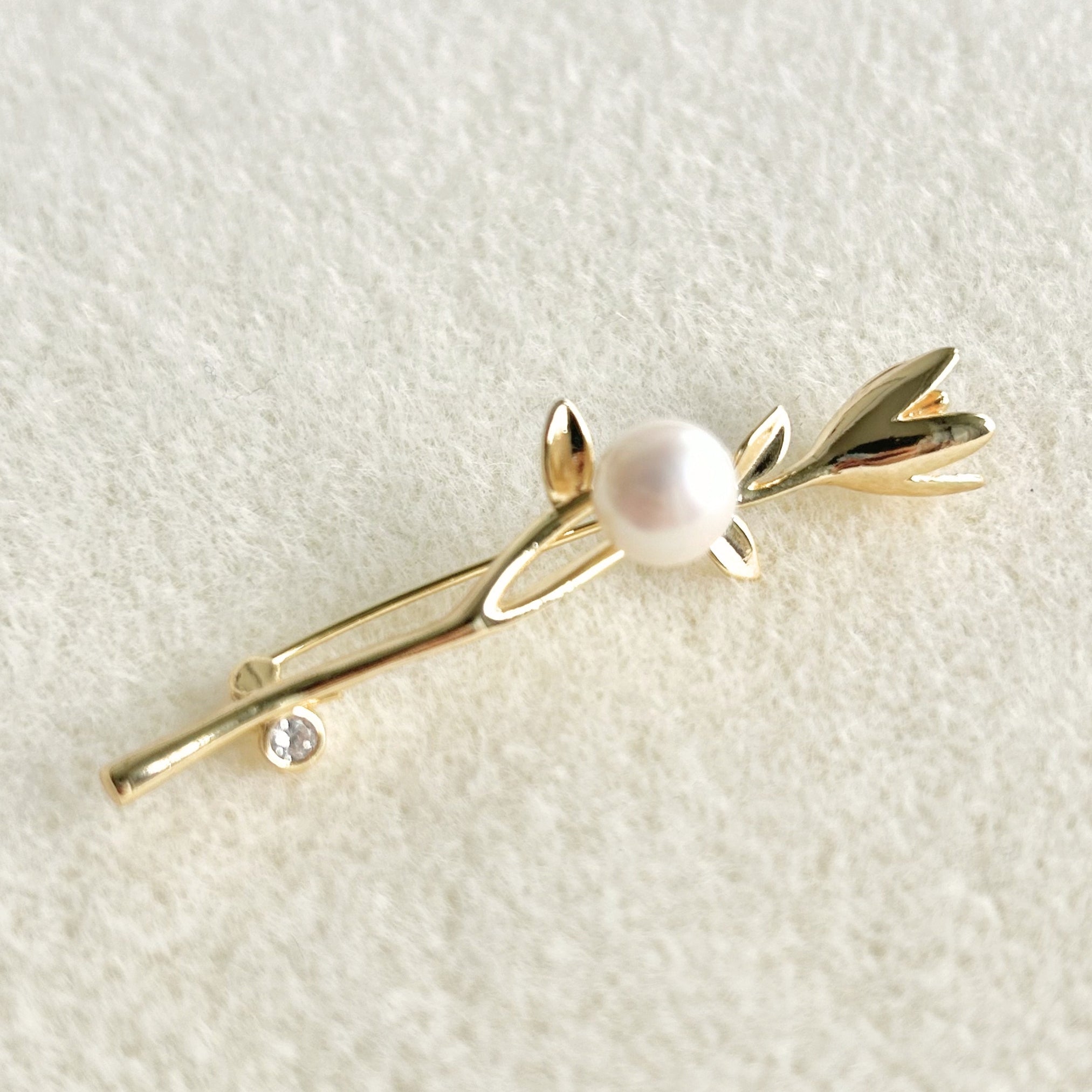 Freshwater Pearl Flower Brooch featuring natural pearl and gold-plated brass by Toronto-based Meng Jewellery