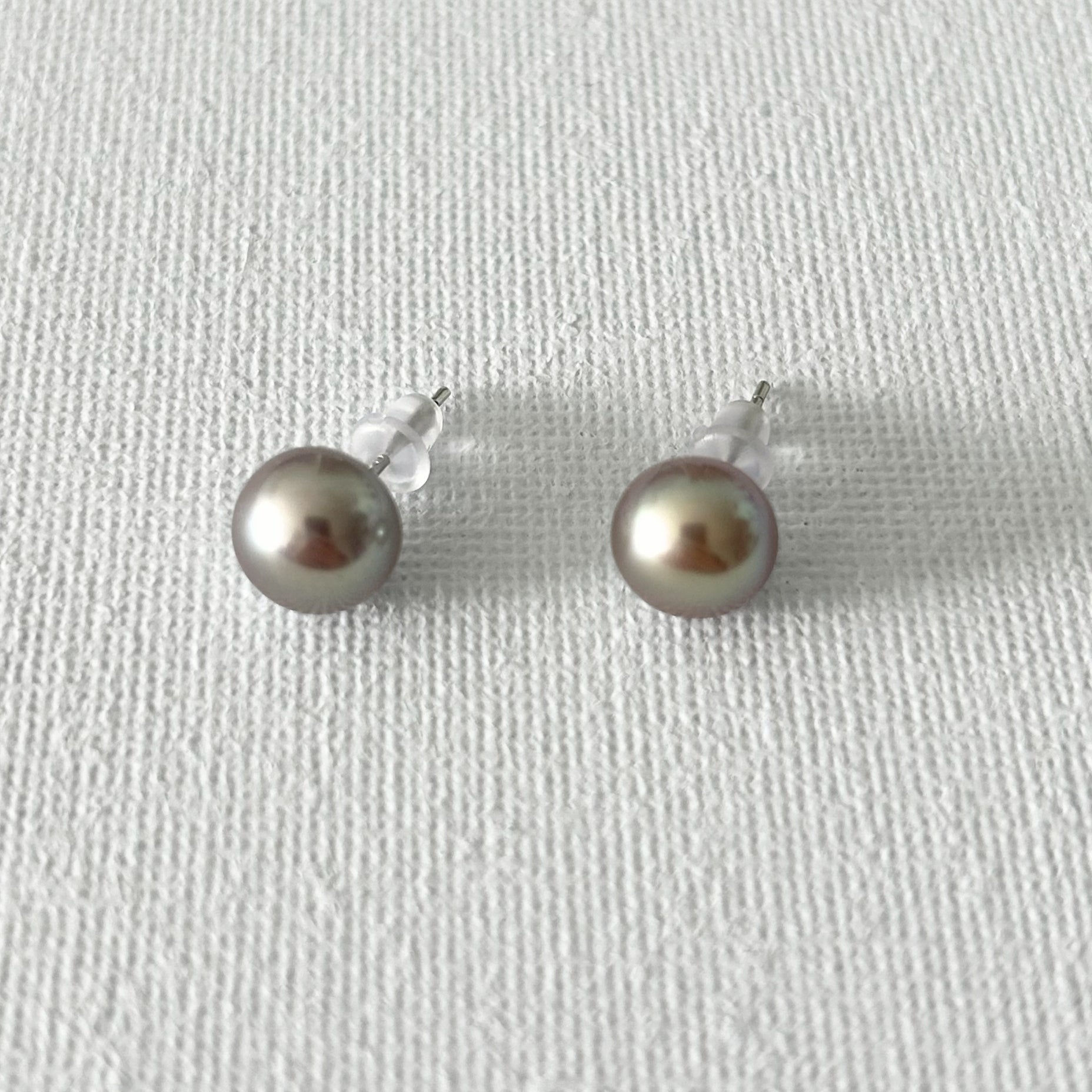 Peacock Color Oval Natural Pearl Studs in Sterling Silver featuring natural freshwater pearl and 925 sterling silver by Toronto-based Meng Jewellery