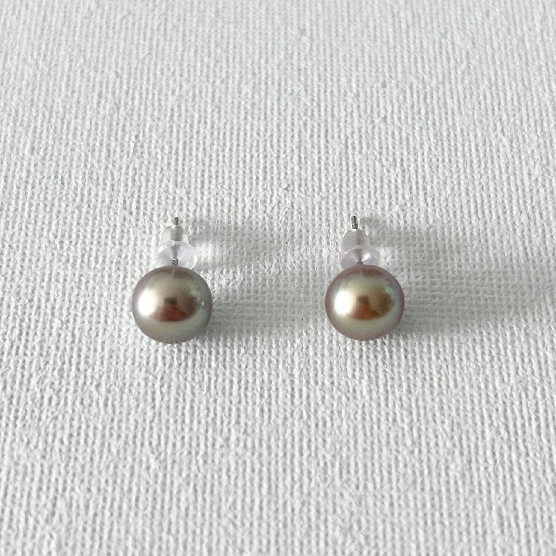 Peacock Color Oval Natural Pearl Studs in Sterling Silver featuring natural freshwater pearl and 925 sterling silver by Toronto-based Meng Jewellery