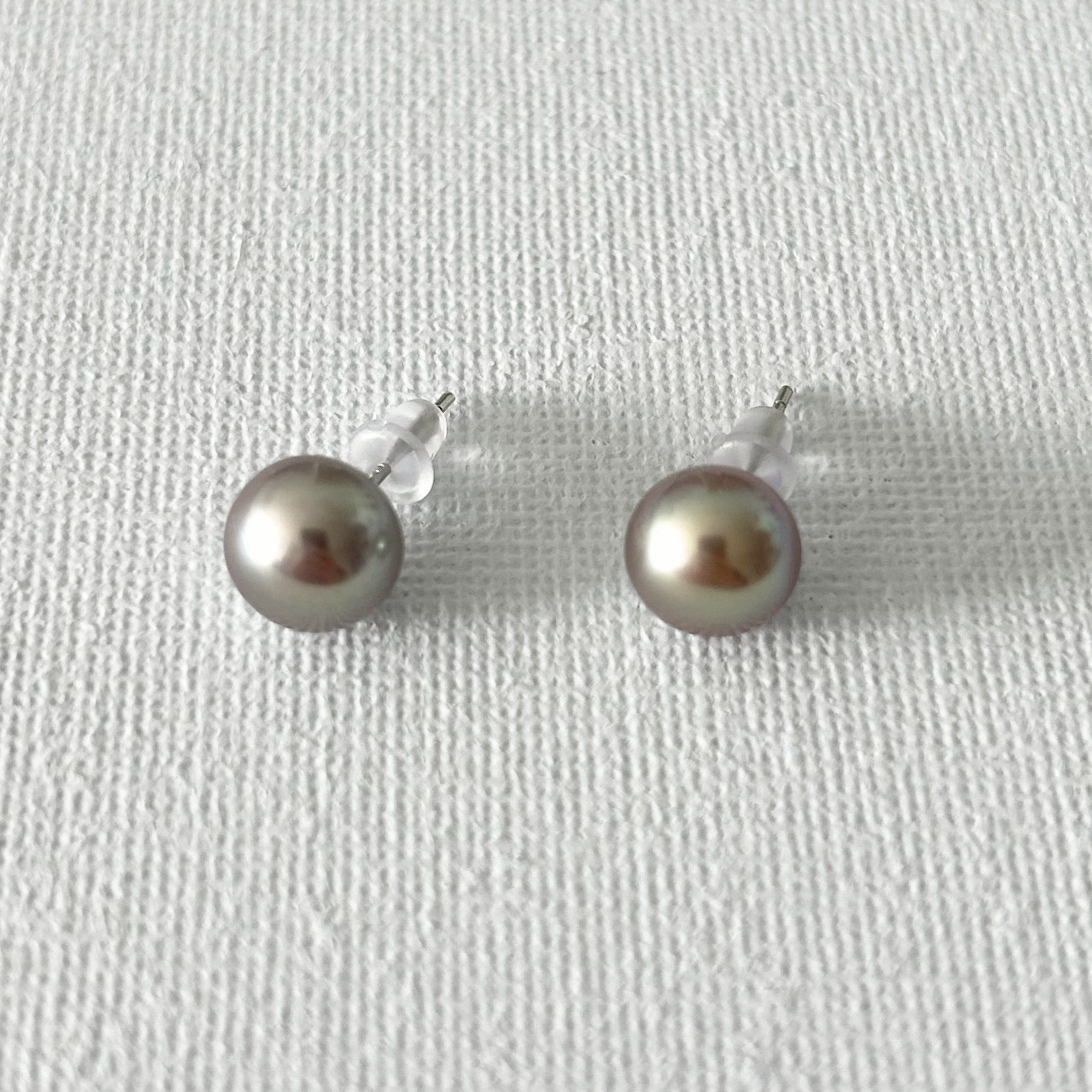 Peacock Color Oval Natural Pearl Studs in Sterling Silver featuring natural freshwater pearl and 925 sterling silver by Toronto-based Meng Jewellery