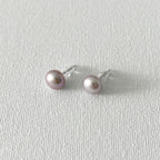 Peacock Color Oval Natural Pearl Studs in Sterling Silver featuring natural freshwater pearl and 925 sterling silver by Toronto-based Meng Jewellery