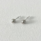 Minimal Natural Pearl Stud Earrings 5–5.5mm in Sterling Silver featuring natural freshwater pearl and 925 sterling silver by Toronto-based Meng Jewellery