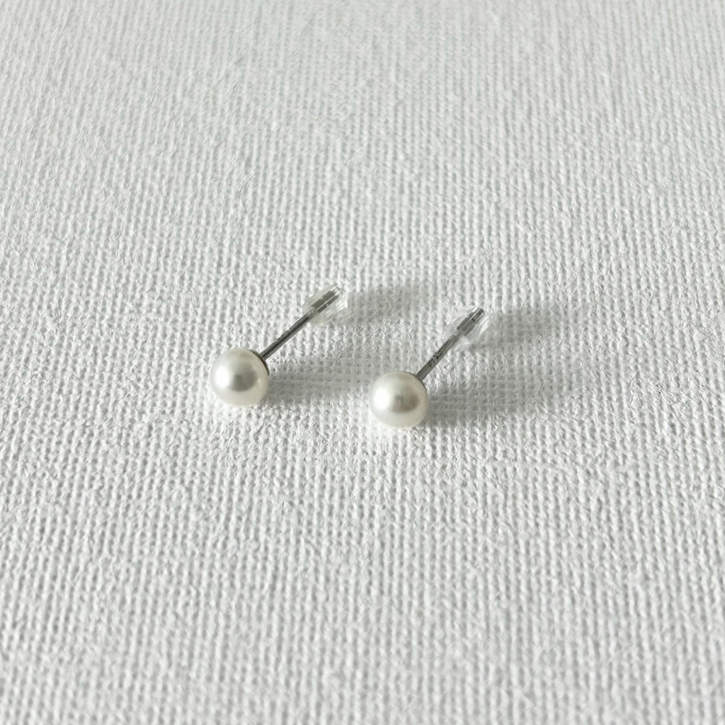 Minimal Natural Pearl Stud Earrings 5–5.5mm in Sterling Silver featuring natural freshwater pearl and 925 sterling silver by Toronto-based Meng Jewellery