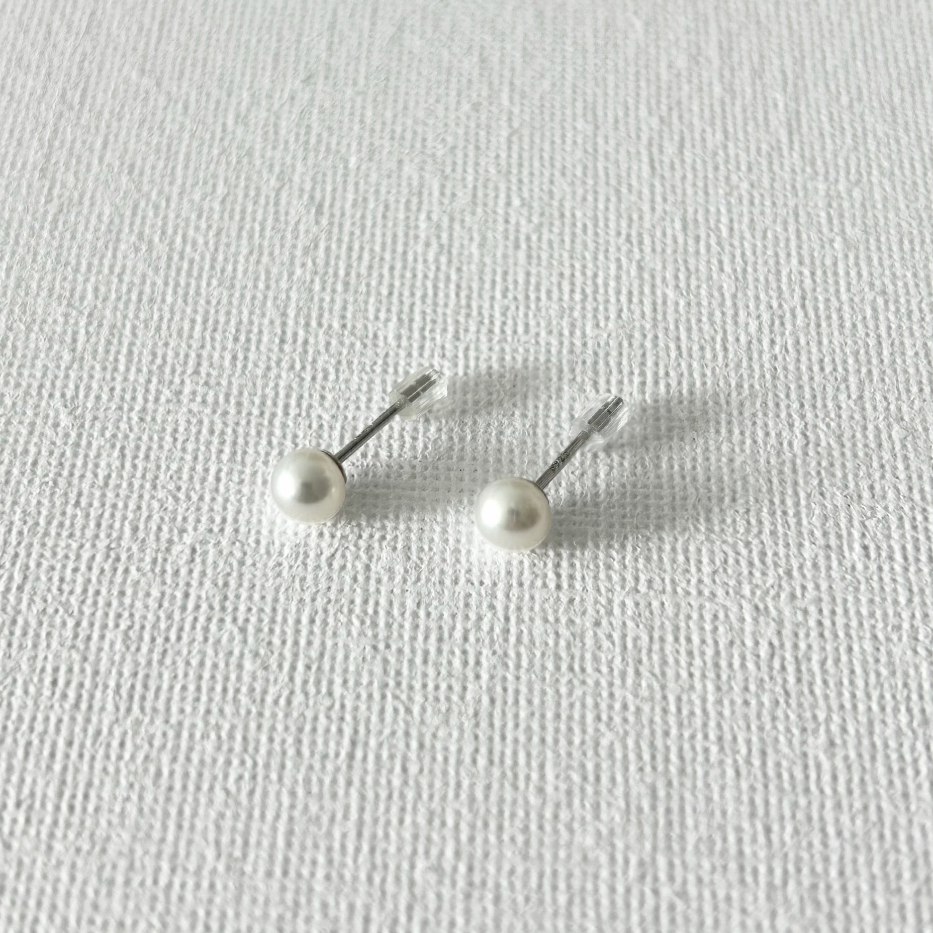 Minimal Natural Pearl Stud Earrings 5–5.5mm in Sterling Silver featuring natural freshwater pearl and 925 sterling silver by Toronto-based Meng Jewellery