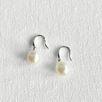 Natural Pearl Silver Hook Earrings featuring natural freshwater pearl, zircon and 925 sterling silver, gold-plated finish by Toronto-based Meng Jewellery