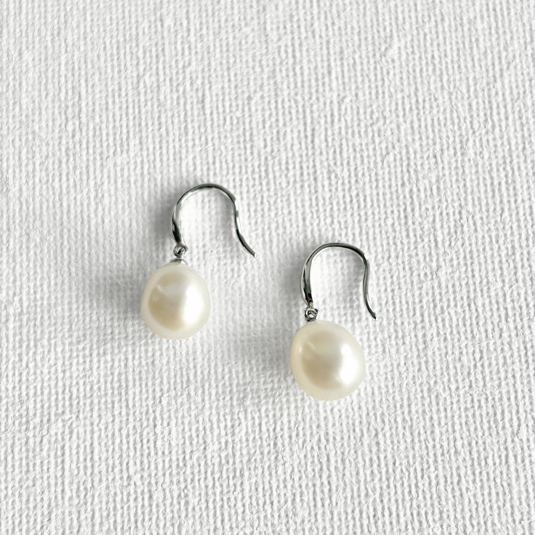 Natural Pearl Silver Hook Earrings featuring natural freshwater pearl, zircon and 925 sterling silver, gold-plated finish by Toronto-based Meng Jewellery
