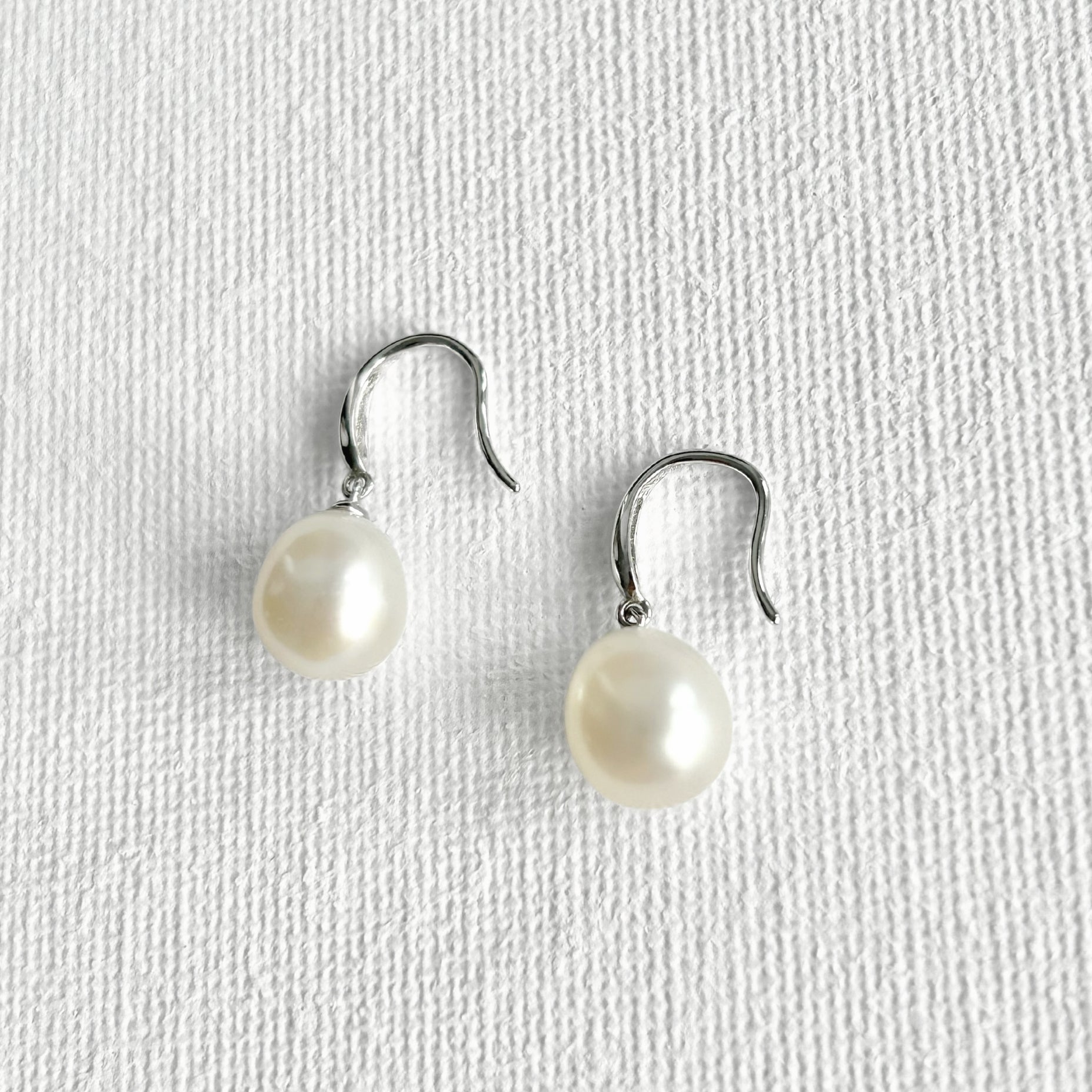Natural Pearl Silver Hook Earrings featuring natural freshwater pearl, zircon and 925 sterling silver, gold-plated finish by Toronto-based Meng Jewellery