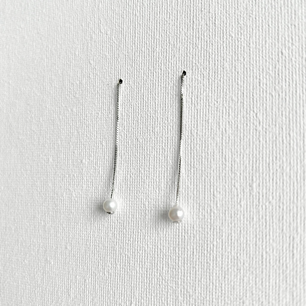 Natural White Pearl Threader Earrings in Sterling Silver featuring natural freshwater pearl and 925 sterling silver by Toronto-based Meng Jewellery