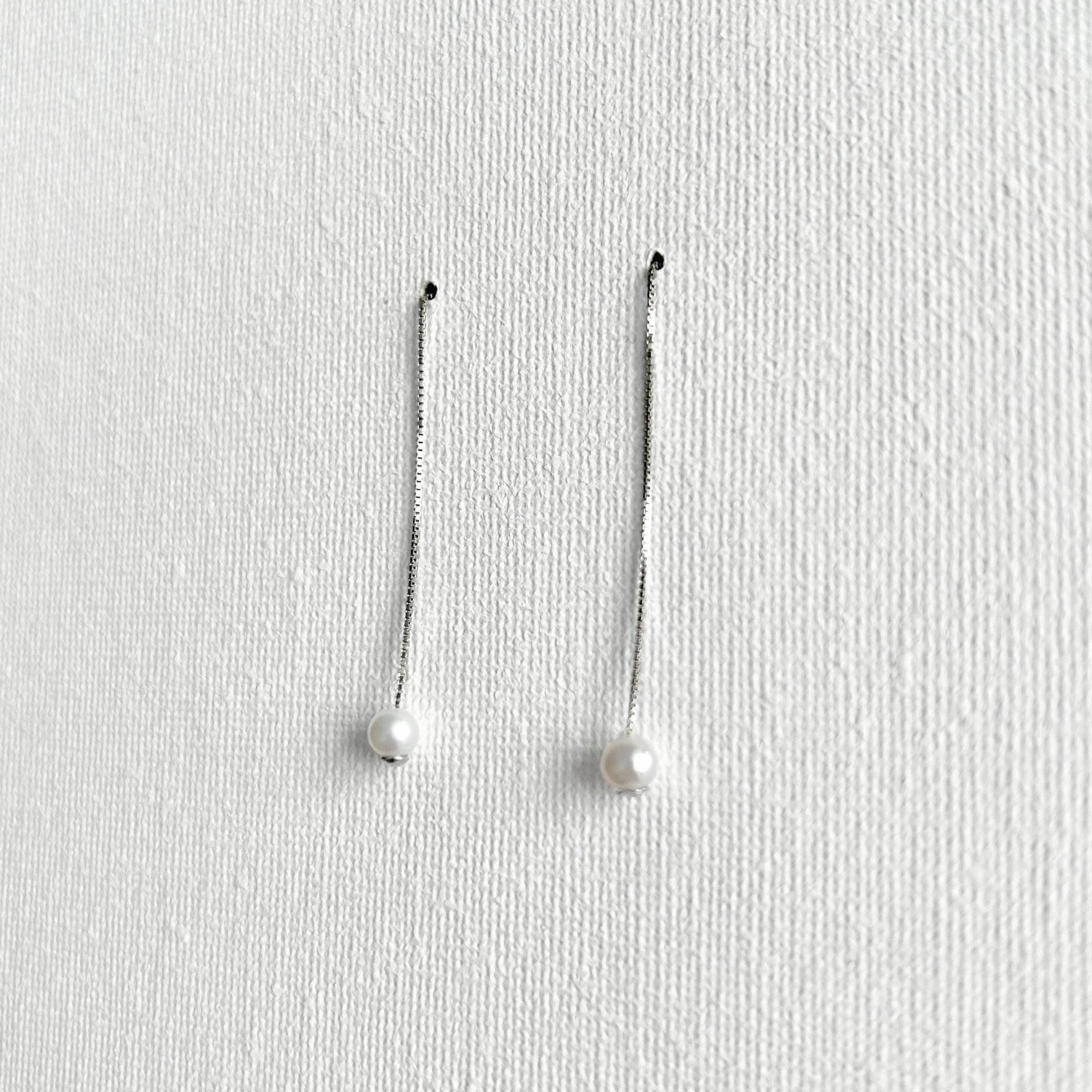 Natural White Pearl Threader Earrings in Sterling Silver featuring natural freshwater pearl and 925 sterling silver by Toronto-based Meng Jewellery