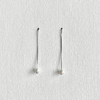 Natural White Pearl Threader Earrings in Sterling Silver featuring natural freshwater pearl and 925 sterling silver by Toronto-based Meng Jewellery