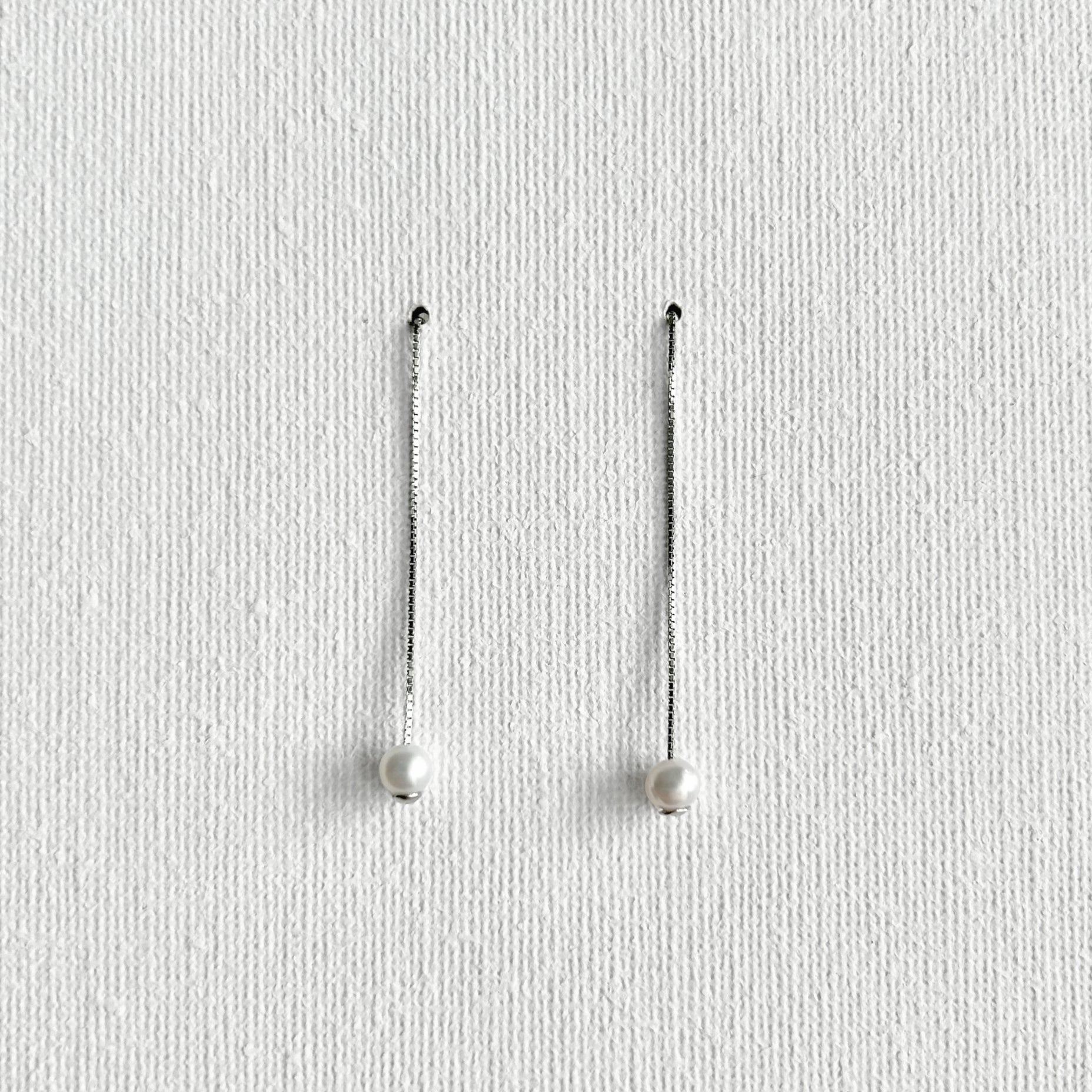 Natural White Pearl Threader Earrings in Sterling Silver featuring natural freshwater pearl and 925 sterling silver by Toronto-based Meng Jewellery