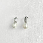 Natural Pearl Silver Moon Earrings featuring natural freshwater pearl, zircon and 925 sterling silver, gold-plated finish by Toronto-based Meng Jewellery