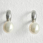 Natural Pearl Silver Moon Earrings featuring natural freshwater pearl, zircon and 925 sterling silver, gold-plated finish by Toronto-based Meng Jewellery