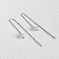Natural White Pearl Threader Earrings in Sterling Silver featuring natural freshwater pearl and 925 sterling silver by Toronto-based Meng Jewellery