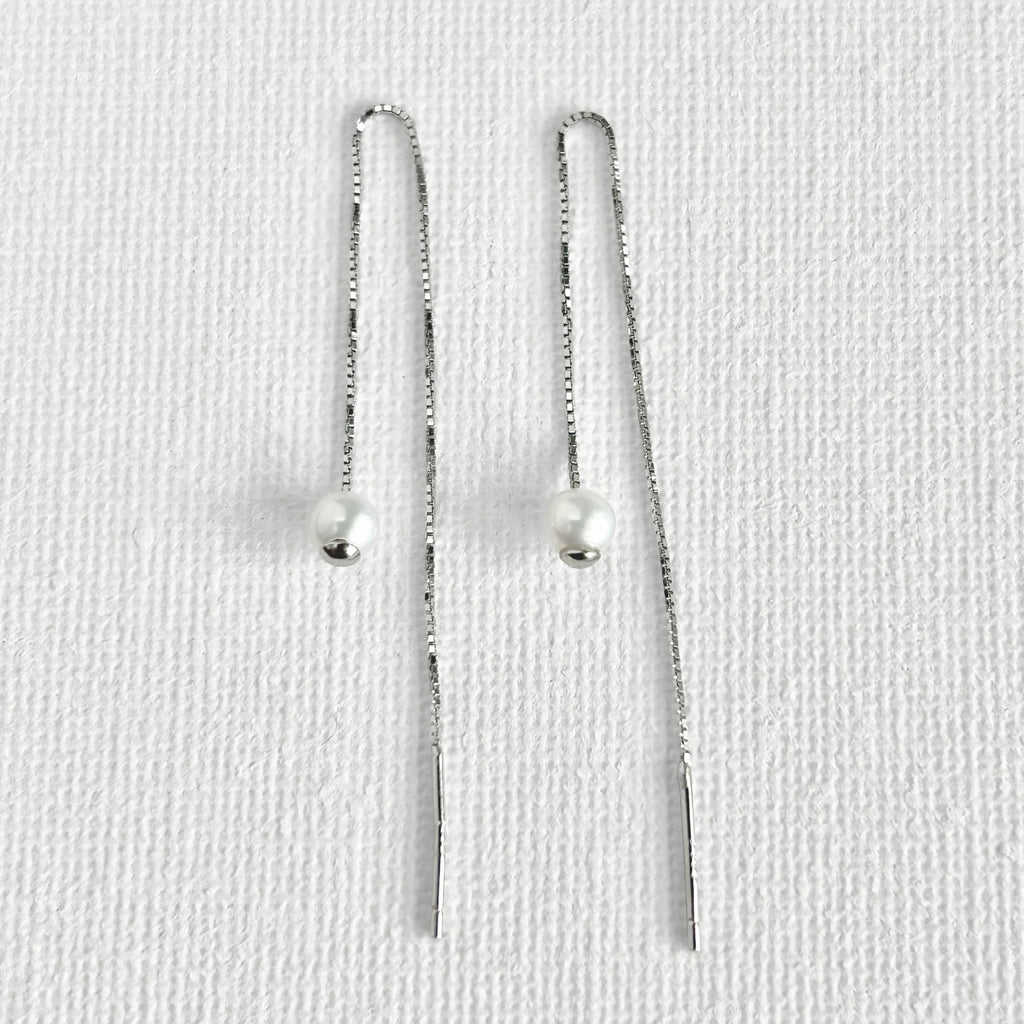 Natural White Pearl Threader Earrings in Sterling Silver featuring natural freshwater pearl and 925 sterling silver by Toronto-based Meng Jewellery