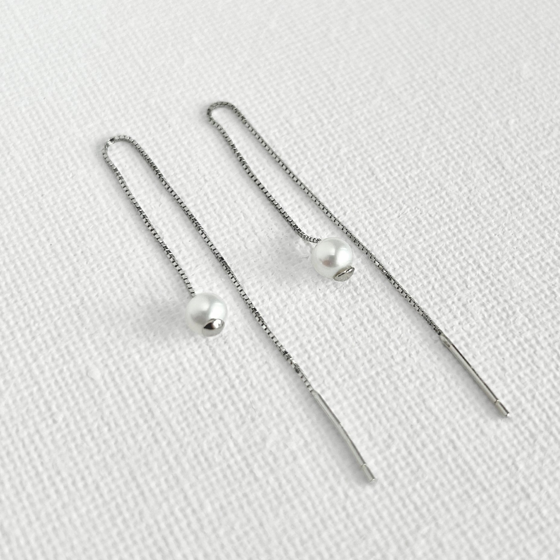 Natural White Pearl Threader Earrings in Sterling Silver featuring natural freshwater pearl and 925 sterling silver by Toronto-based Meng Jewellery