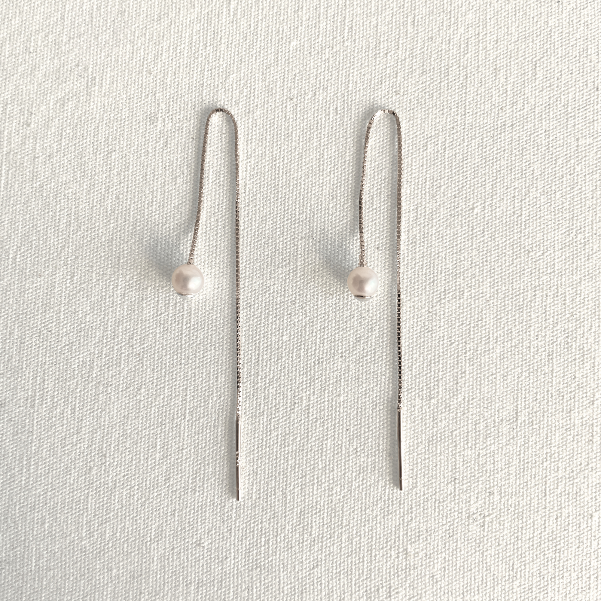Natural White Pearl Threader Earrings in Sterling Silver featuring natural freshwater pearl and 925 sterling silver by Toronto-based Meng Jewellery
