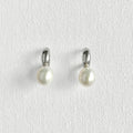 Natural Pearl Silver Moon Earrings featuring natural freshwater pearl, zircon and 925 sterling silver, gold-plated finish by Toronto-based Meng Jewellery