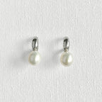 Natural Pearl Silver Moon Earrings featuring natural freshwater pearl, zircon and 925 sterling silver, gold-plated finish by Toronto-based Meng Jewellery