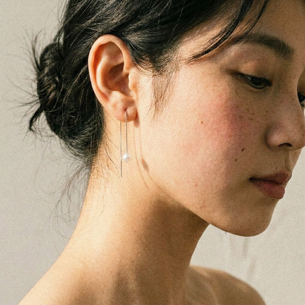 Natural White Pearl Threader Earrings in Sterling Silver featuring natural freshwater pearl and 925 sterling silver by Toronto-based Meng Jewellery