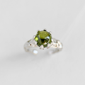 Adjustable silver ring with moss green stone and organic textured band